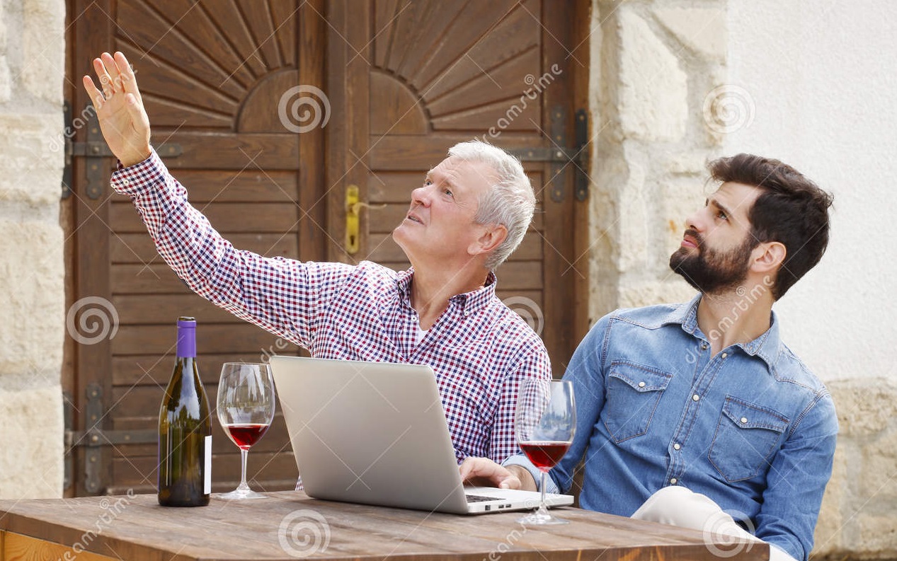 small-business-portrait-young-senior-men-tasting-red-wine-wine-cellar-professional-winemakers-sitting-desk-60185268